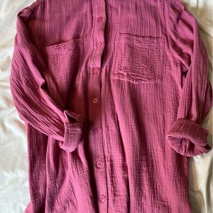 Pink buttoned up shirt